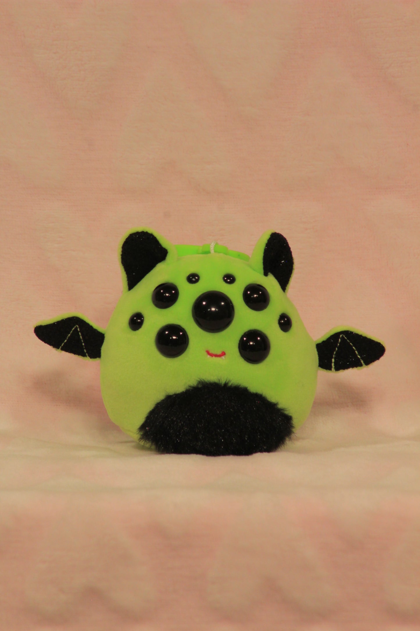 Clip on green bat squish 1